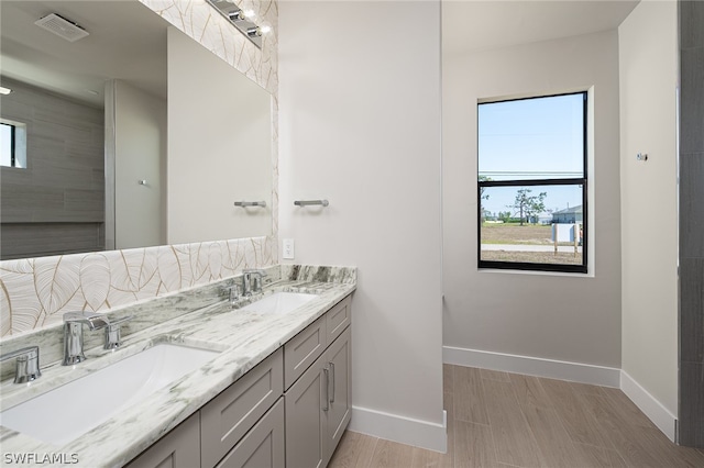 bathroom with double sink vanity