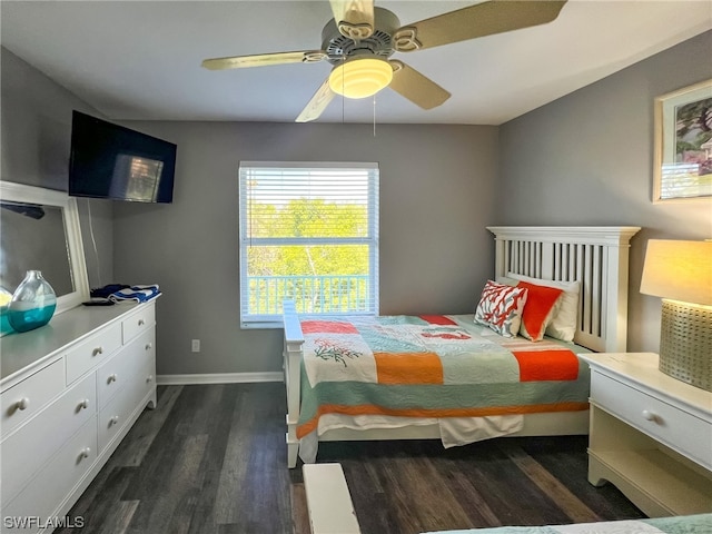 bedroom featuring dark hardwood / wood-style floors and ceiling fan