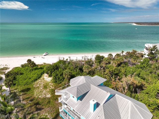 aerial view with a beach view and a water view