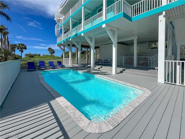 view of swimming pool with a patio area