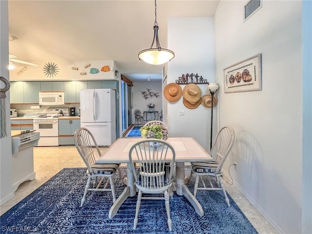 view of tiled dining area