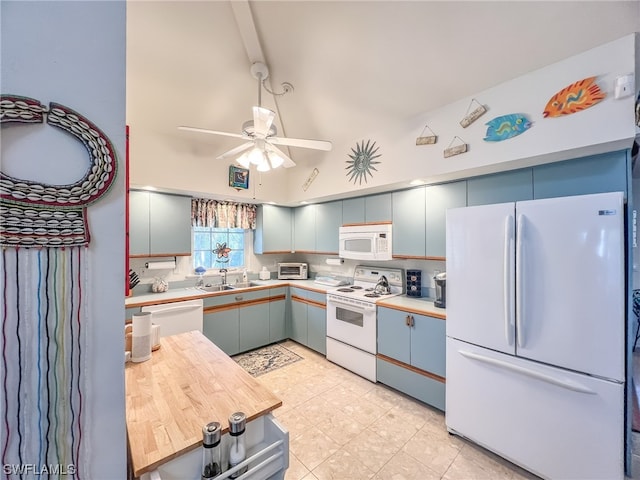 kitchen featuring light tile patterned floors, white appliances, sink, and ceiling fan