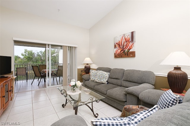 tiled living room with high vaulted ceiling