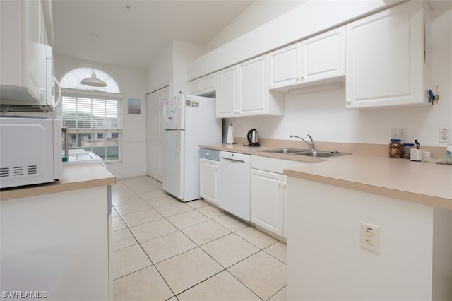 kitchen with white appliances, white cabinets, sink, and light tile floors