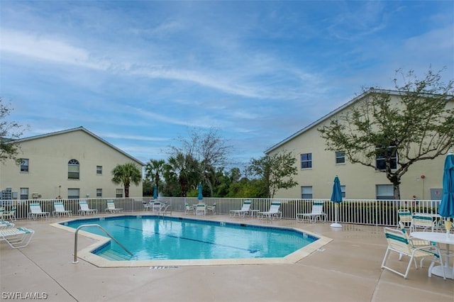 view of pool with a patio area