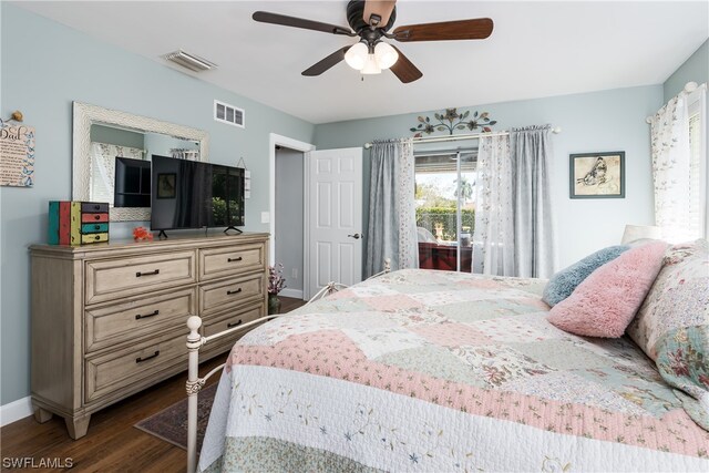 bedroom featuring ceiling fan and dark hardwood / wood-style flooring