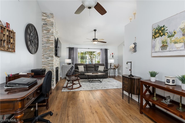 office space with wood-type flooring and ceiling fan