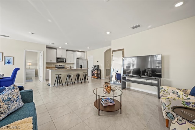 tiled living room with sink