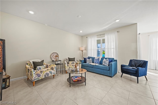 living room featuring light tile floors