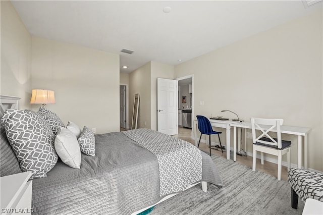 bedroom with light wood-type flooring