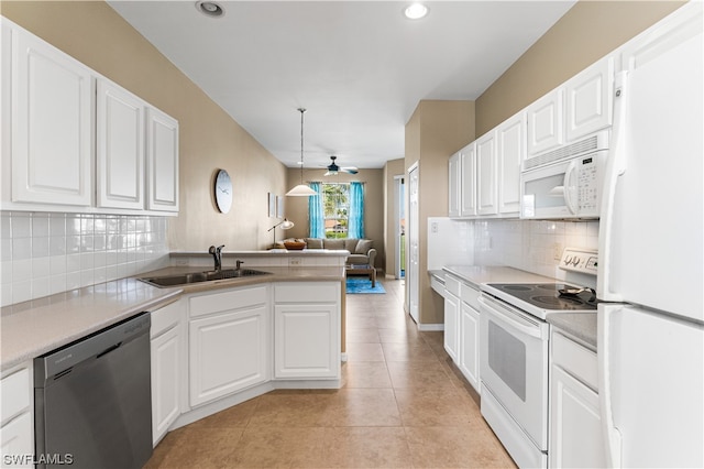 kitchen featuring ceiling fan, white appliances, sink, light tile floors, and white cabinets