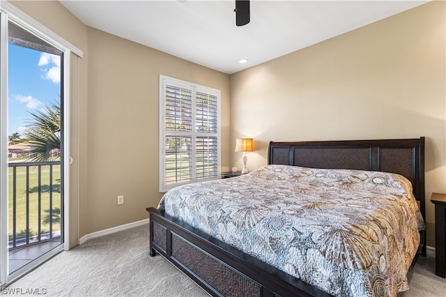 carpeted bedroom with access to outside and ceiling fan