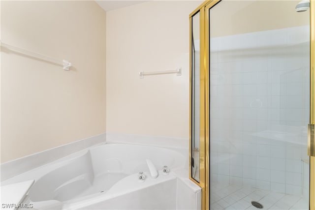 bathroom featuring separate shower and tub and vanity