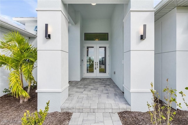 entrance to property featuring french doors