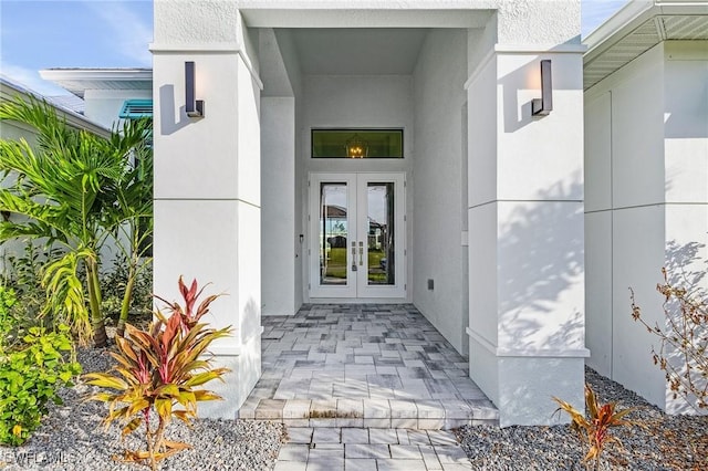 entrance to property featuring french doors