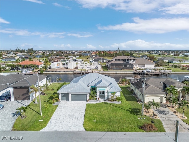 drone / aerial view with a water view