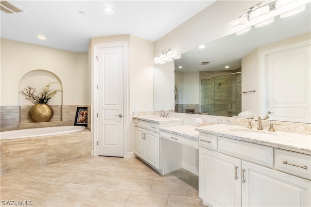 bathroom with vanity, tile patterned floors, and separate shower and tub