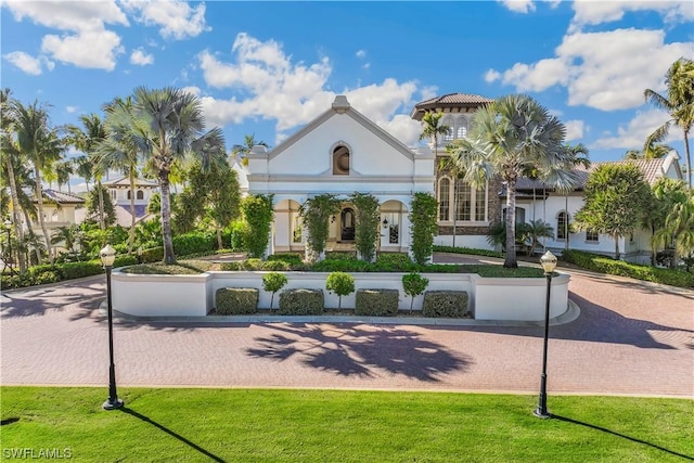 exterior space featuring a front lawn