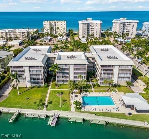 bird's eye view with a water view