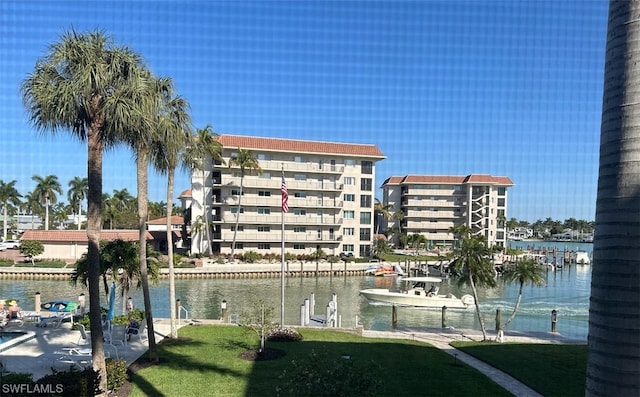 view of building exterior with a water view