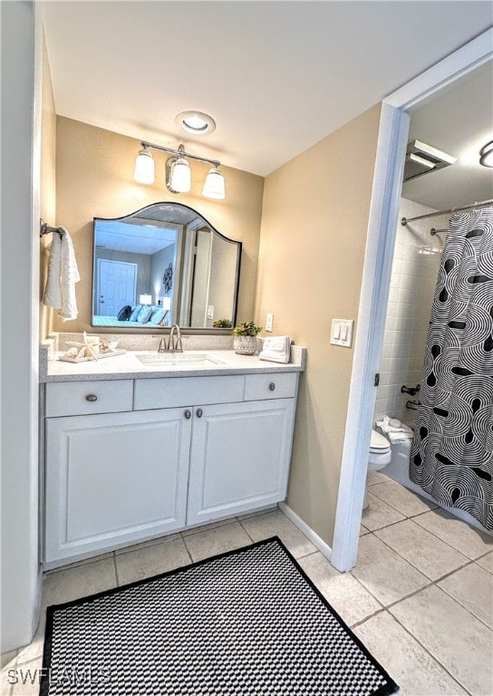 full bathroom with tile patterned floors, shower / tub combo with curtain, vanity, and toilet