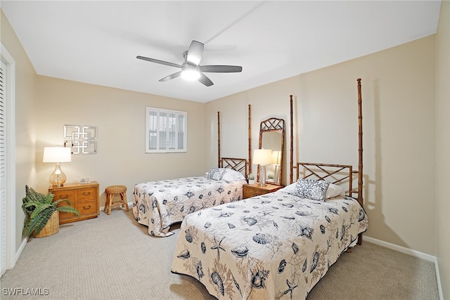 bedroom featuring ceiling fan and carpet floors