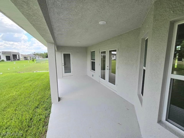 view of patio / terrace featuring french doors