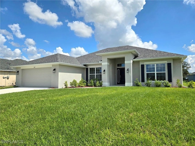 view of front facade featuring a front lawn and a garage