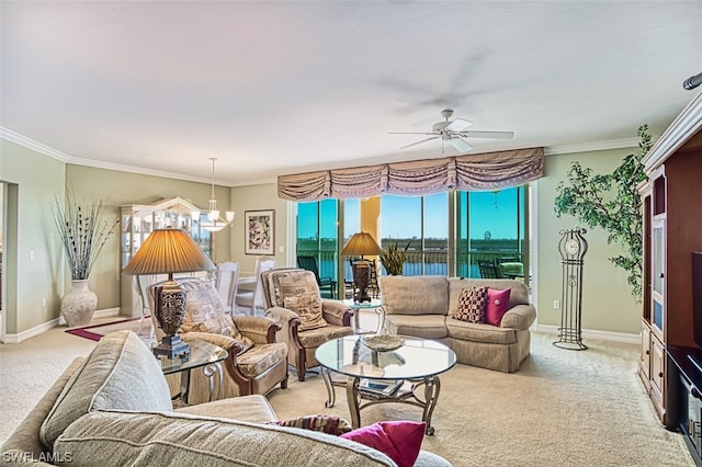 carpeted living room featuring crown molding and ceiling fan with notable chandelier