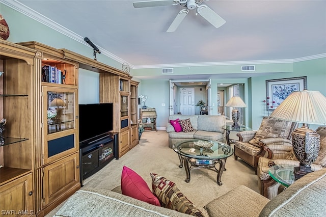 living room featuring light colored carpet, ornamental molding, and ceiling fan