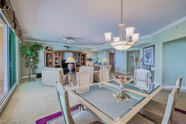 dining space featuring light carpet, crown molding, and ceiling fan with notable chandelier