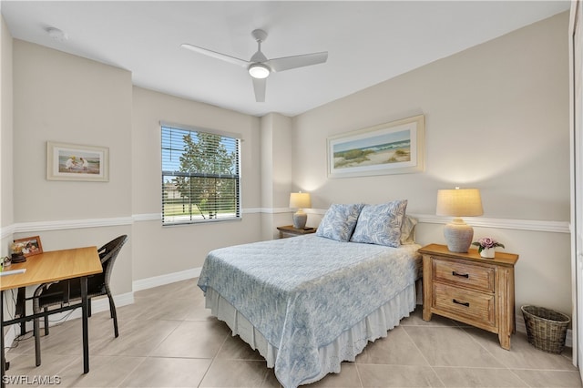 tiled bedroom with ceiling fan