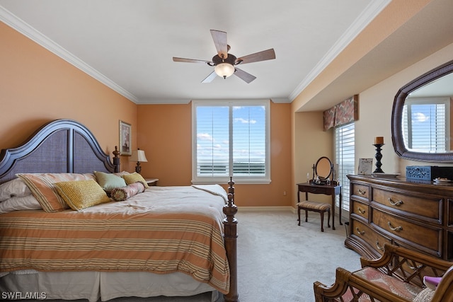 bedroom with ceiling fan, light colored carpet, and ornamental molding