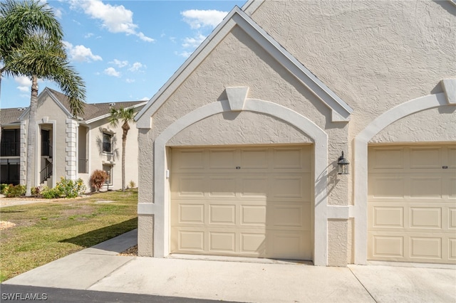 garage featuring a yard