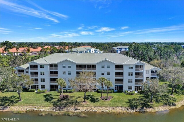 bird's eye view with a water view