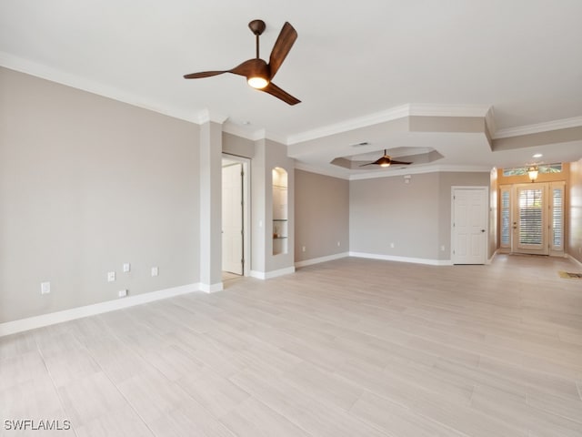 unfurnished living room featuring ceiling fan, light hardwood / wood-style floors, and ornamental molding