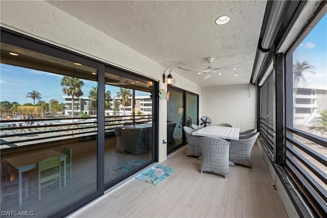 interior space featuring ceiling fan