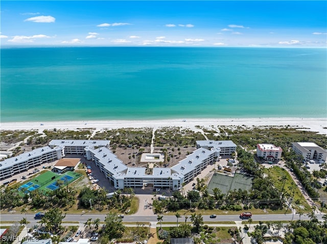 aerial view with a view of the beach and a water view