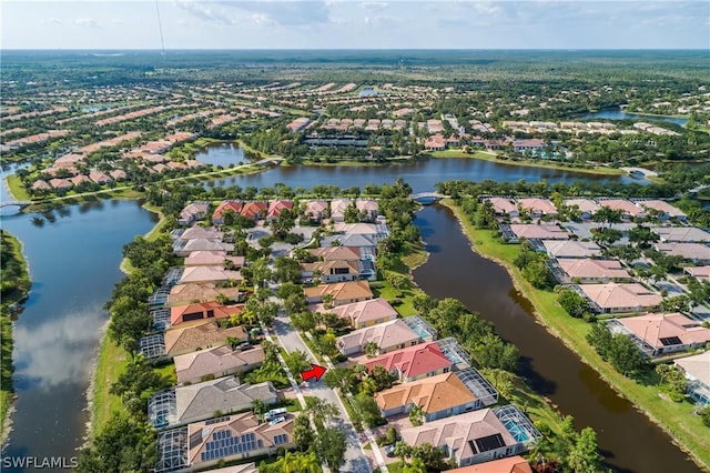 aerial view featuring a water view and a residential view