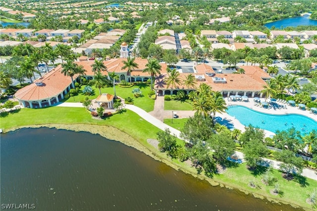 birds eye view of property featuring a water view