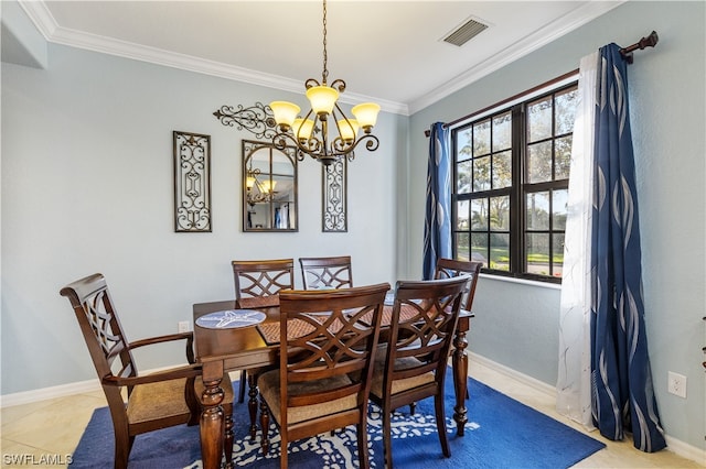 dining space with light tile patterned flooring, ornamental molding, and an inviting chandelier