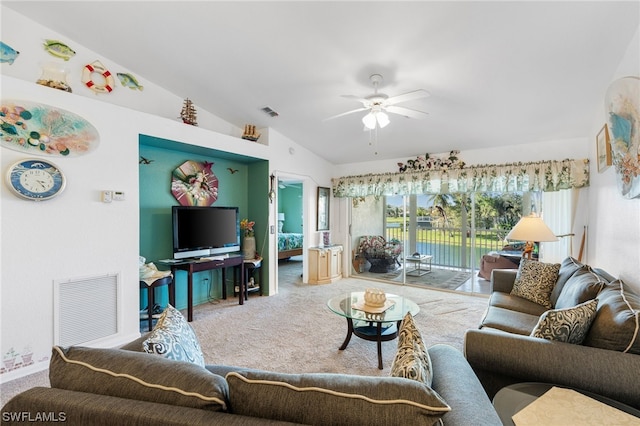 living room featuring vaulted ceiling, light colored carpet, and ceiling fan