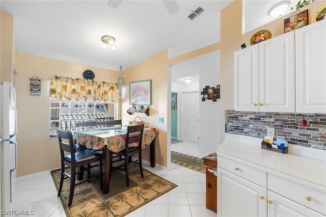 dining area with light tile floors