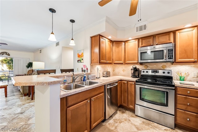 kitchen with kitchen peninsula, ceiling fan, light tile floors, sink, and appliances with stainless steel finishes