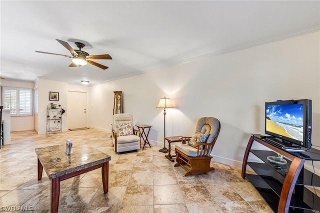 tiled living room featuring crown molding and ceiling fan