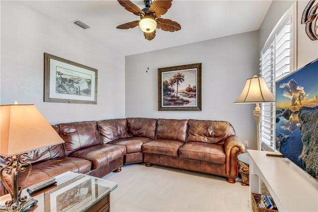 living room featuring ceiling fan