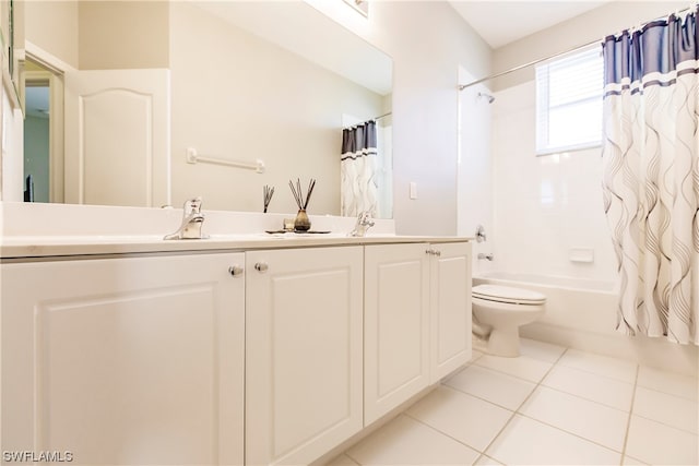 full bathroom featuring shower / tub combo, vanity, tile flooring, and toilet