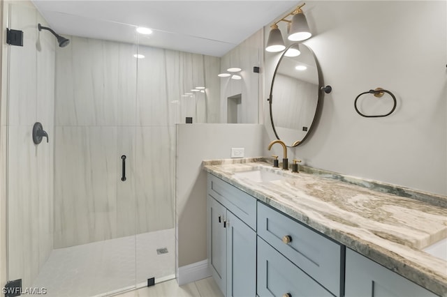 bathroom featuring vanity and walk in shower