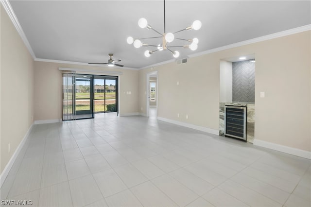 unfurnished living room with wine cooler, ceiling fan with notable chandelier, light tile floors, and ornamental molding