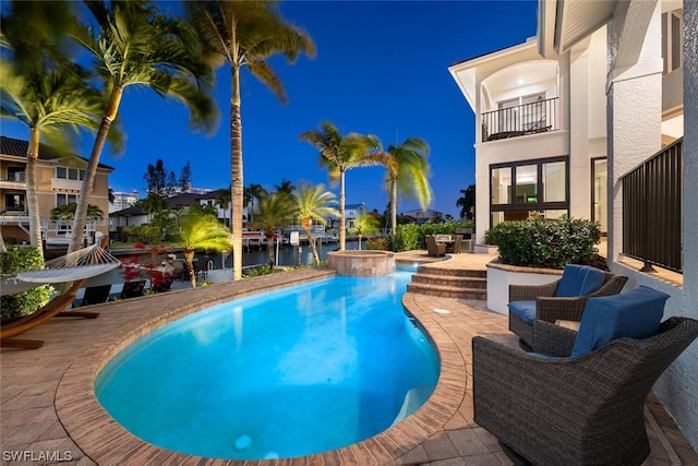 view of pool with a patio